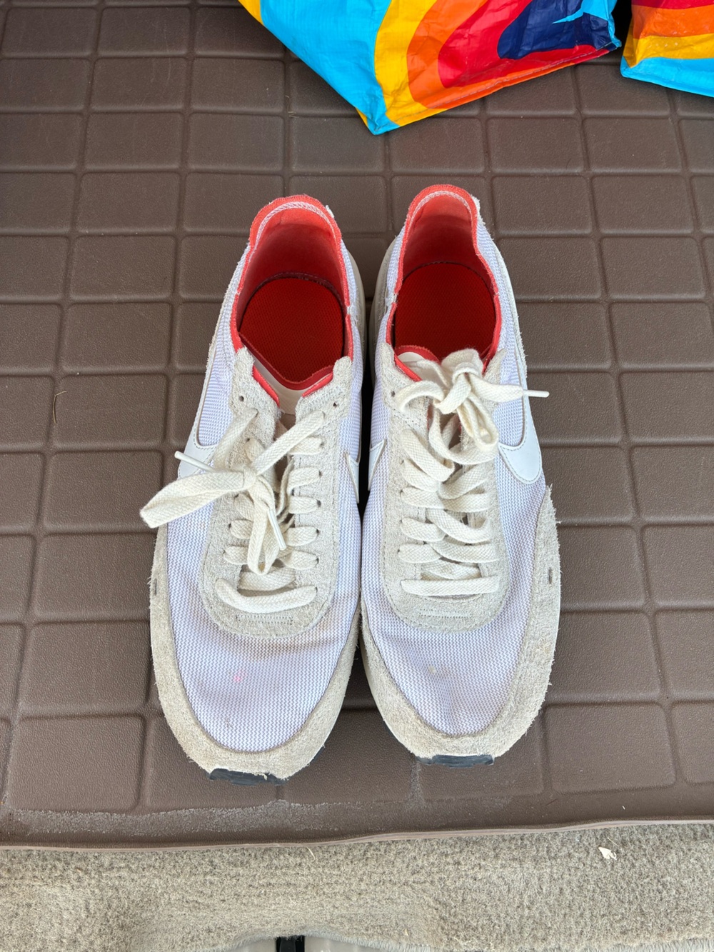 Nike White Low-Top Sneakers with Red Lining
